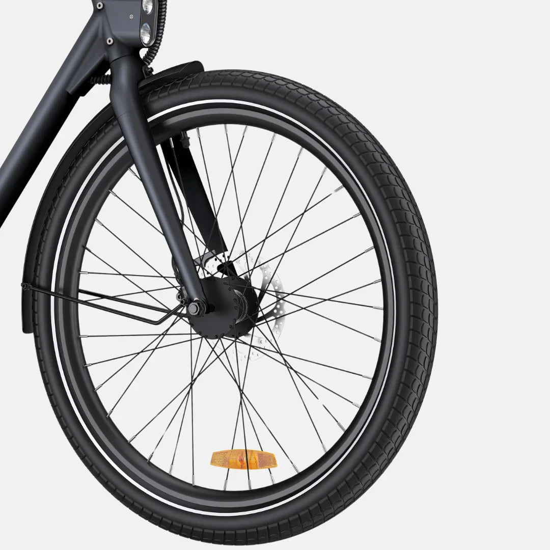 The product is an Electric bike, brand Engwe, model P275 ST. The image shows the front wheel with black rims, tires, and a disc brake. The bike also features a reflector for increased visibility. The overall design is minimalist and modern.