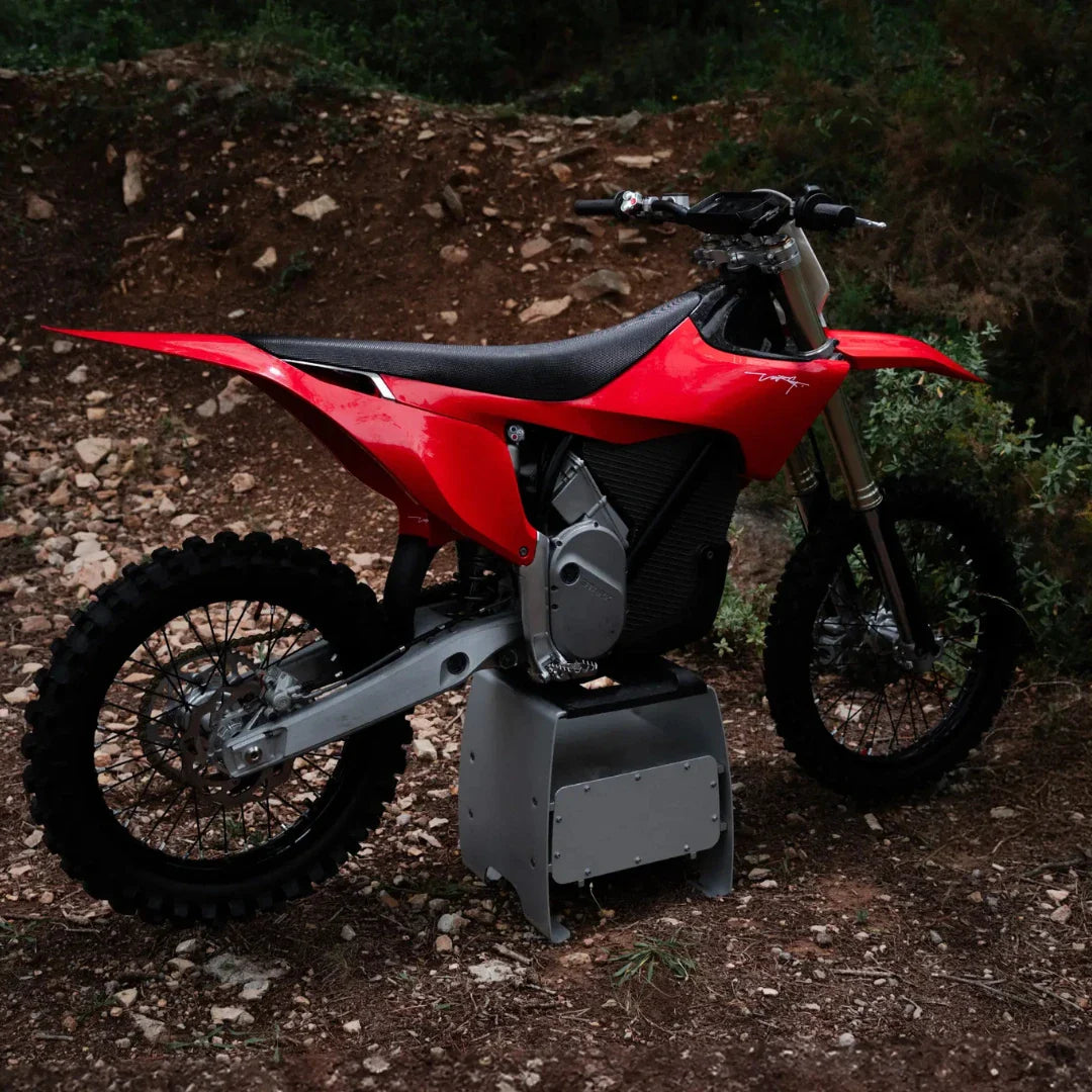 Electric Motocross Motorcycle Stark Varg, featuring a sleek red design and robust tires.