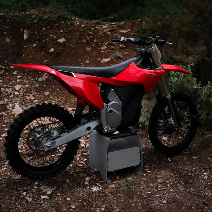 Electric Motocross Motorcycle Stark Varg, featuring a sleek red design and robust tires.