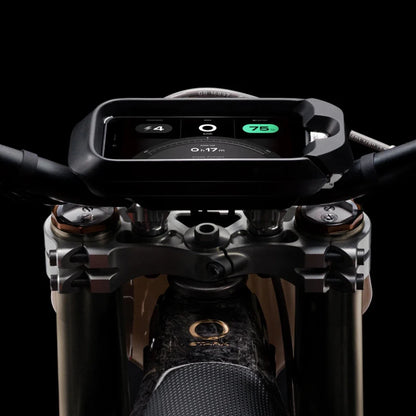 A close-up shot of the handlebars and display of the Stark Varg electric motocross bike.