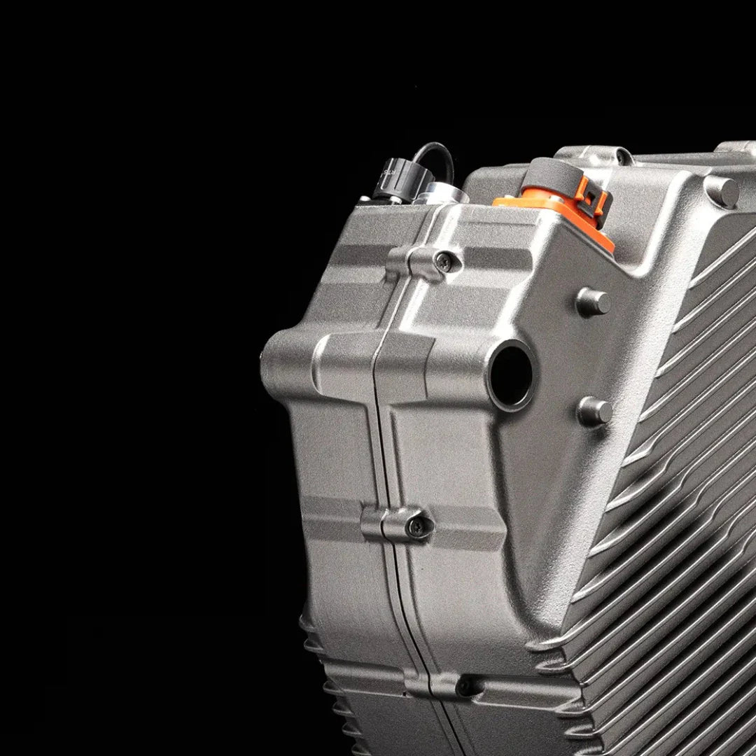 Close-up shot of the motor housing of the Stark Varg electric motocross bike on a black background.