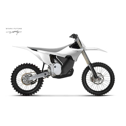 Side view of the Stark Varg electric motocross bike, showcasing its sleek design and tires.