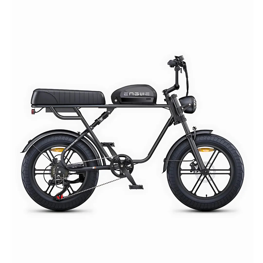 The product in the picture is an electric bike, brand Engwe, model M1. The picture shows a bike with wide tires, a minimalist frame, and a comfortable seat. The bike also has a visible battery on the frame and classic pedals and brakes. The overall design is modern and compact, making it suitable for city riding.