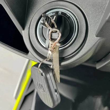 Close-up shot of the ignition key and keychain for the Electric Motorcycle Felo Fw 06.