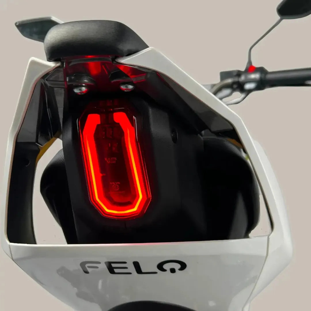 Close-up of the rear of the Electric Motorcycle Felo Fw 06, featuring a sleek design and red lights.