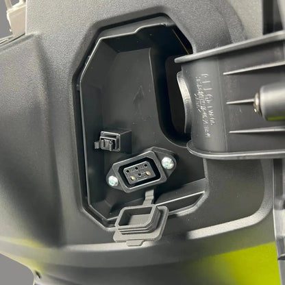 A close-up view of the charging port on the Felo Fw 06 electric motorcycle.