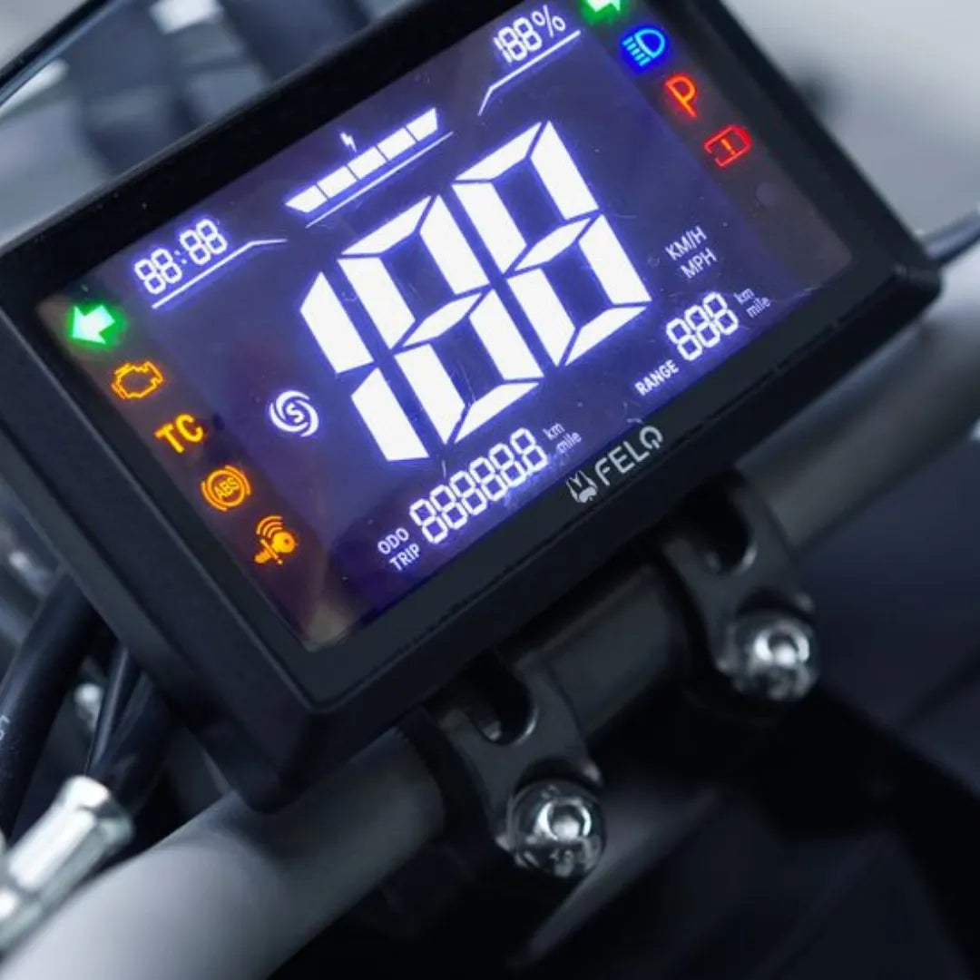 Close-up shot of the dashboard display on an Electric Scooter Felo Fw 06, showing speed and statistics.