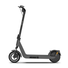 The product in the image is an electric scooter, brand Joyor, model Litego. The image shows a side view of the scooter, which has a minimalist design in dark gray. The front and rear wheels are visible, as are the handlebars equipped with grips. The scooter also has a wide deck for standing, which allows for a comfortable ride.