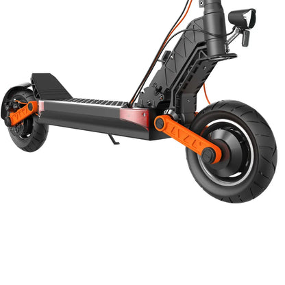 The image shows an Electric Scooter from the brand Joyor, model S10-S. The scooter's construction is visible, featuring a wide deck/footboard, robust tires, and a suspension system. The black and orange color combination adds a modern look, while details like the wheels and supports are designed for enhanced stability and riding comfort.