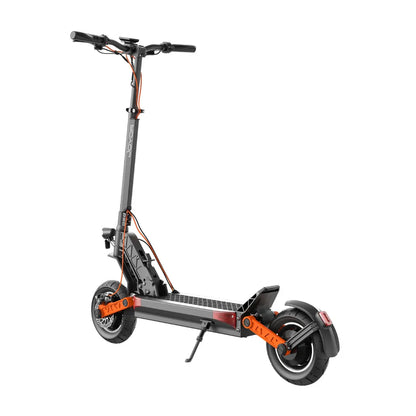 The product is an Electric Scooter, brand Joyor, model S10. The image shows the scooter in black and orange, with ergonomic handlebars, a wide footboard, and large wheels. The rear light and kickstand mount are also visible, indicating practicality and usability during rides.