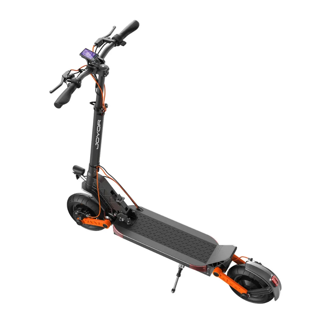 The product is an Electric Scooter, brand Joyor, model S10 S-Z. The image shows a scooter with a robust frame, a wide deck for standing, and handlebars that include a display for information. Large tires and a braking system are also visible, indicating a comfortable and safe ride. The color combination includes black and orange, giving the scooter a sporty appearance.
