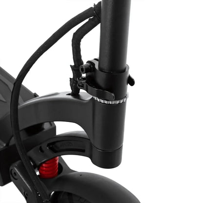 The product in the picture is an electric scooter, model Kaabo Mantis 10 Plus. The scooter's construction is visible, including the tightening system that holds the handlebars, and part of the suspension, highlighted in red. The picture also shows parts of the wheel and frame, indicating a robust design suitable for riding on various terrains.