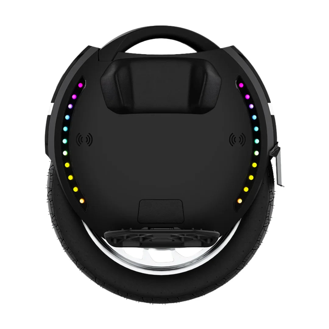 The product is an electric unicycle, brand KingSong, model 18XL. The image shows the top surface of the unicycle, which is black and features an ergonomically designed handle. Along the edge of the device are multi-colored LED lights, adding to its aesthetic appeal. The wheels are wide, ensuring a stable ride.