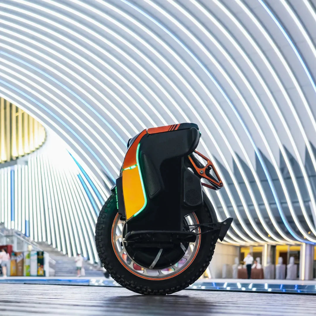 The product pictured is an Electric Unicycle (EUC), brand Kingsong, model S19. The image shows a side view of the unicycle, which features a robust wheel and bright LED lights in various colors. The background is modern, with wavy light elements, giving the overall image a dynamic and futuristic look.