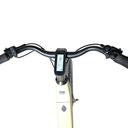 The product is an electric bike, brand MS Energy, model C300. The image shows the control panel on the handlebars, which includes a digital display with information about speed, battery level, and other data. The handlebars are equipped with ergonomic grips for a comfortable ride. The bike has a bright frame color, giving it a modern look.