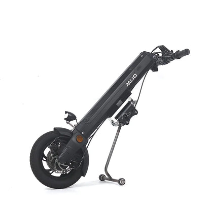 The product shown in the picture is an Electric Scooter, model Mijo MT01. The image displays the scooter in an upright position, with a visible black frame, front wheel, and brakes. The scooter also features a kickstand for stability and a headlight, indicating its functionality and safety.