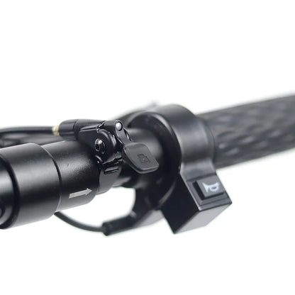 The product is an Electric Scooter, model Mijo MT01. The image shows a part of the handlebars, with control grips and buttons for managing the scooter's functions visible. The color is predominantly black, and the material gives a sense of robustness and durability.