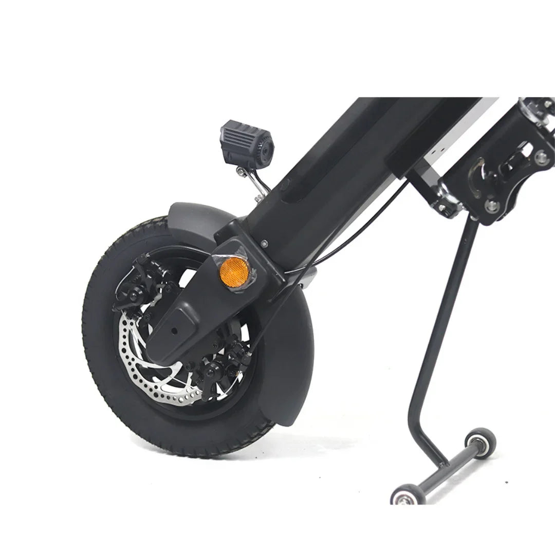The product in the image is an Electric scooter, model Mijo MT01. The image shows the front wheel assembly with a disc brake system, protective fender, and reflector. The wheel is equipped with a robust rubber tire, ensuring better stability and grip. A kickstand is also visible, allowing for stable parking of the scooter.
