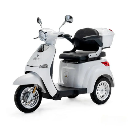 The product is an Electric motorcycle, brand Veleco, model Cristal. The image shows the scooter in white, featuring a comfortable seat with a backrest and a luggage rack at the rear. The scooter also has classic mirrors and front lights, giving it a modern look.