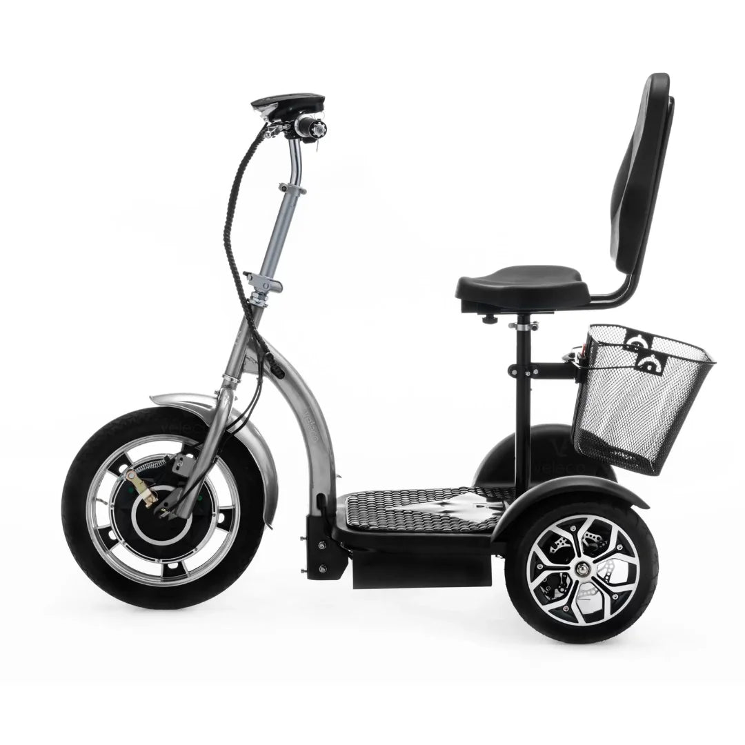 The product is an Electric mobility scooter, model Veleco ZT16. The image shows the scooter with wide wheels, a comfortable seat, and handlebars for control. It also has a storage basket, which increases its functionality. The design is modern and practical, allowing for easy maneuvering.